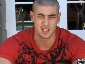 A muscular man masturbates outdoors for gay and straight viewers