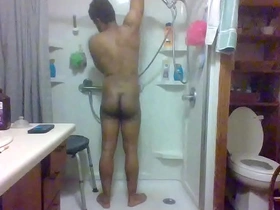Black cock soloboy enjoys solo masturbation in the shower
