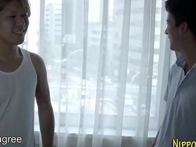 A young Japanese man gets a hand job from a gaijan (non-Japanese Asian) in a hardcore scene.