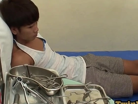 Bottom Asian twink barebacked by doctor in his ambulance